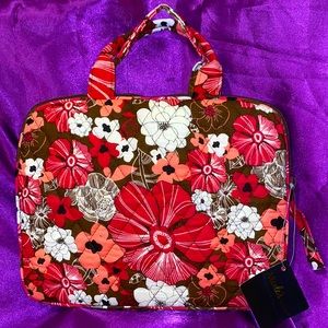 IPad Case. Two handles with a flower design.